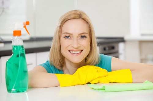 Technician treating a pet stain on carpet in a Stockwell home