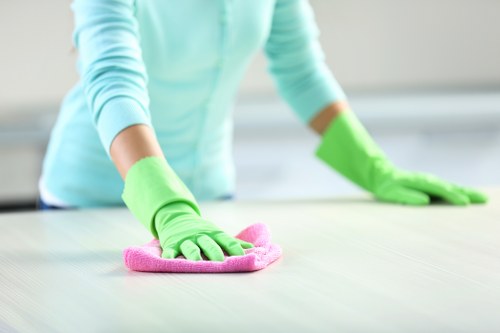 Tidying and floor care during a regular cleaning appointment in Stockwell