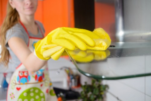 Cleaning newly refurbished kitchen surfaces in Stockwell